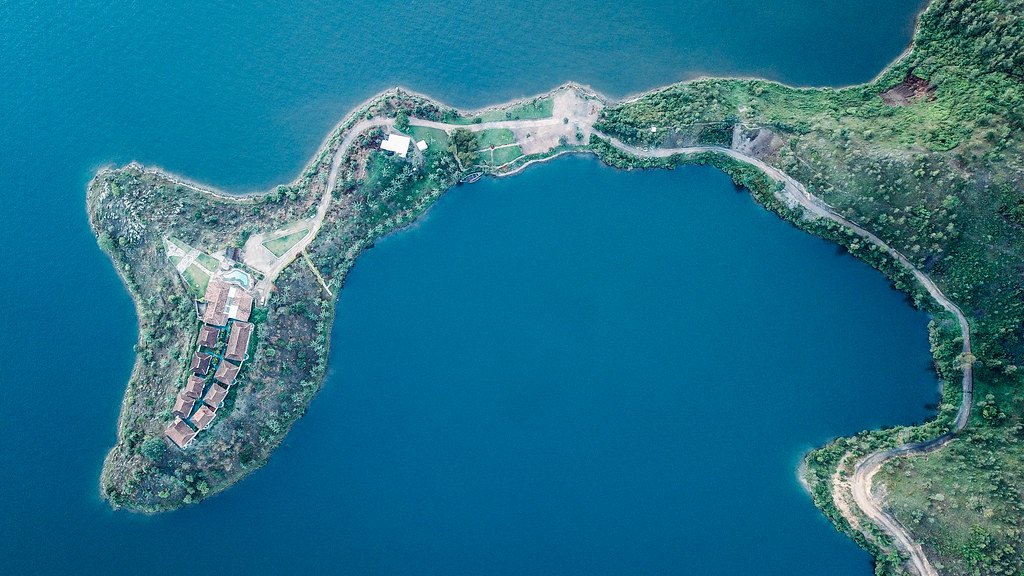 Aerial view of a peninsula resort on Lake Kivu